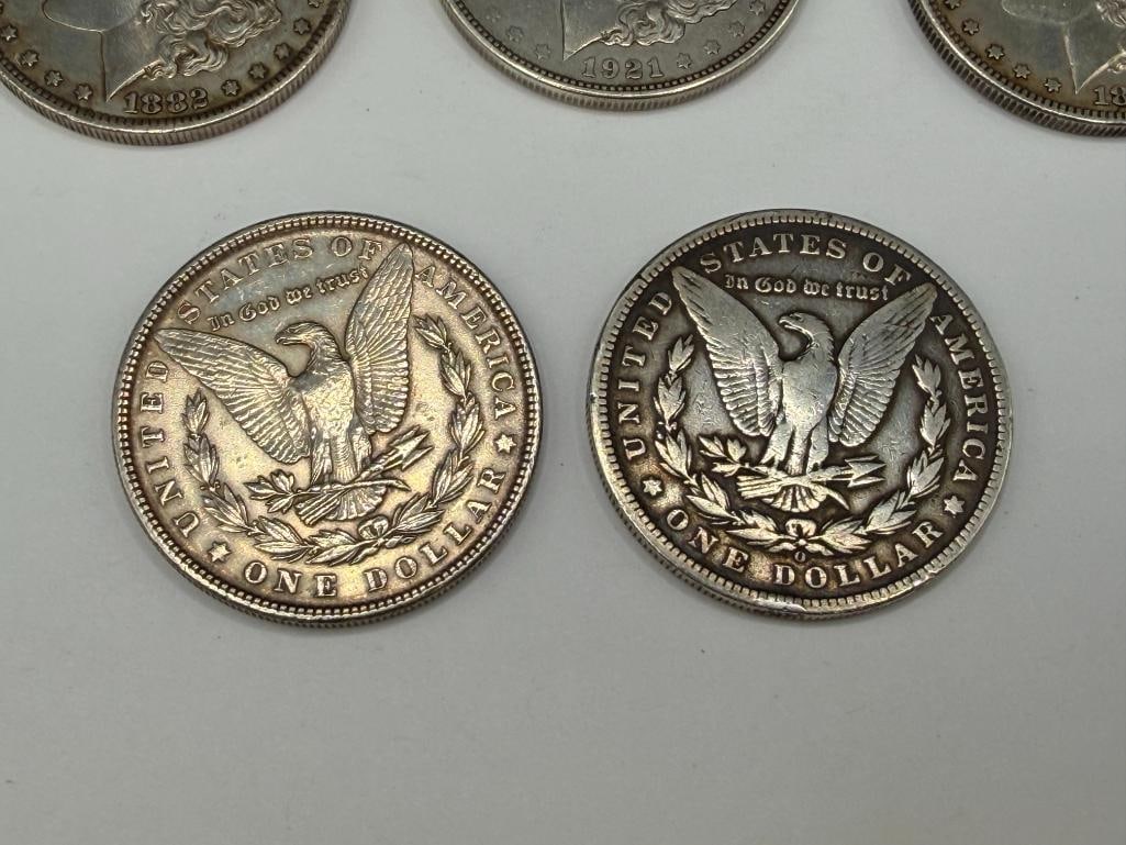 FIVE U.S. MORGAN SILVER DOLLARS FEATURING VARIOUS DATES AND MINT MARKS - 4