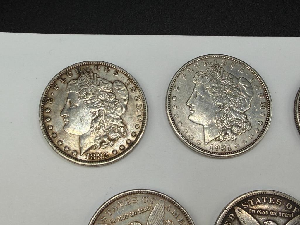 FIVE U.S. MORGAN SILVER DOLLARS FEATURING VARIOUS DATES AND MINT MARKS - 6