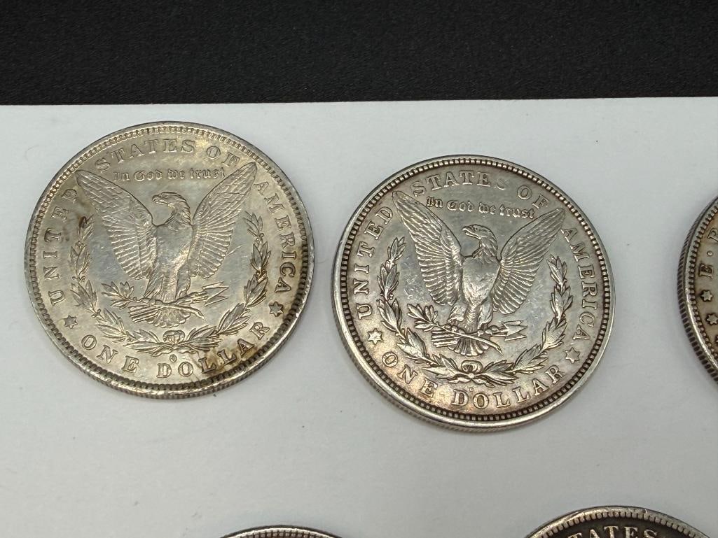 FIVE U.S. MORGAN SILVER DOLLARS FEATURING VARIOUS DATES AND MINT MARKS - 8