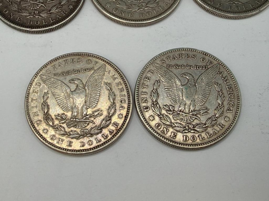 10 U.S. MORGAN SILVER DOLLARS FEATURING VARIOUS DATES AND MINT MARKS - 10