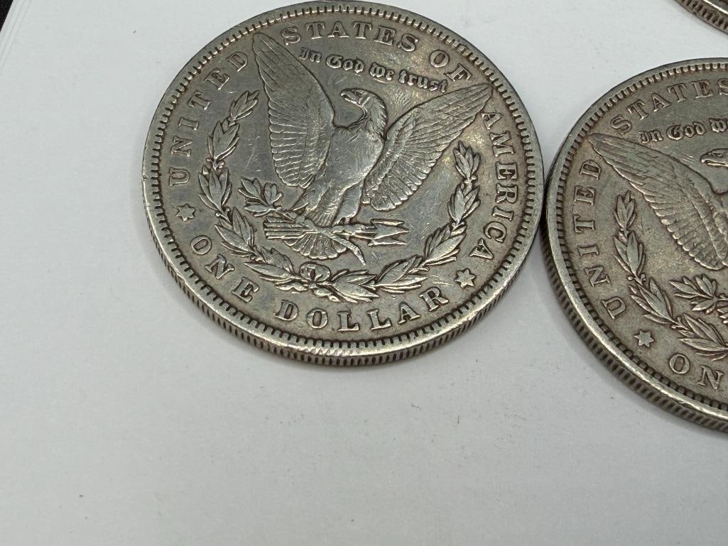 10 U.S. MORGAN SILVER DOLLARS FEATURING VARIOUS DATES AND MINT MARKS - 14
