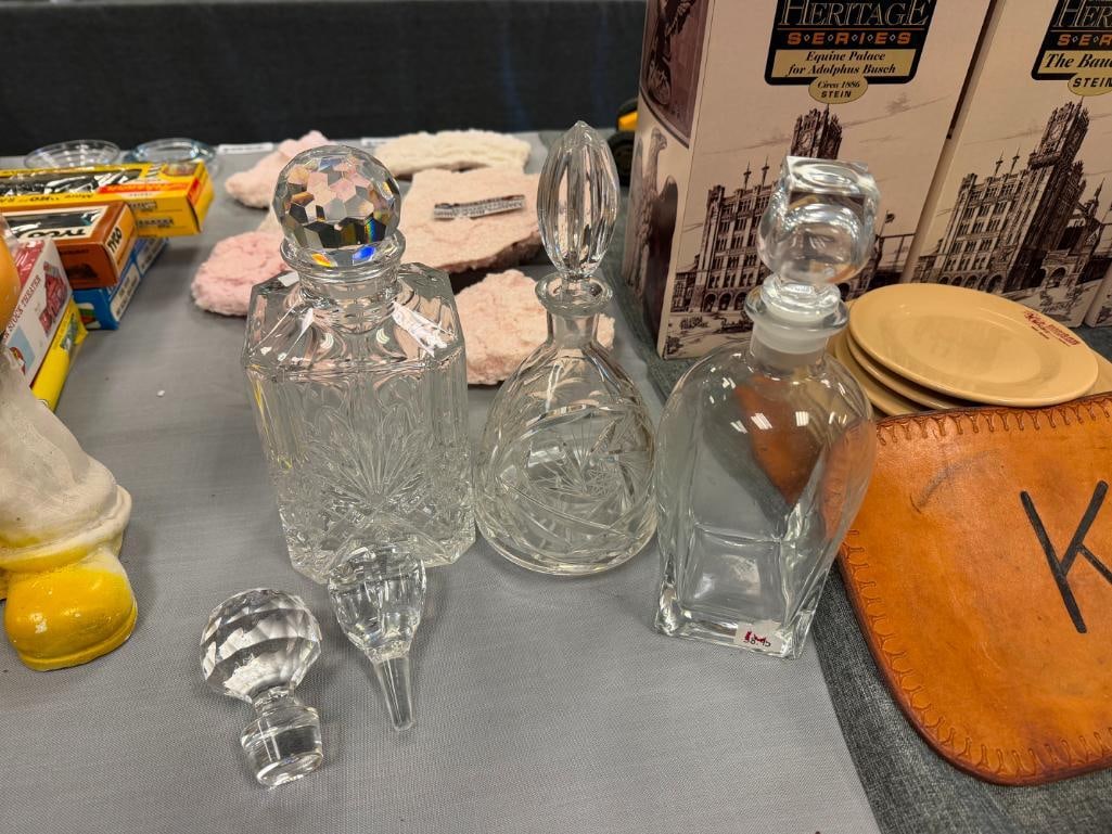 GLASS AND TWO CRYSTAL DECANTERS PLUS TWO EXTRA STOPPERS - 2