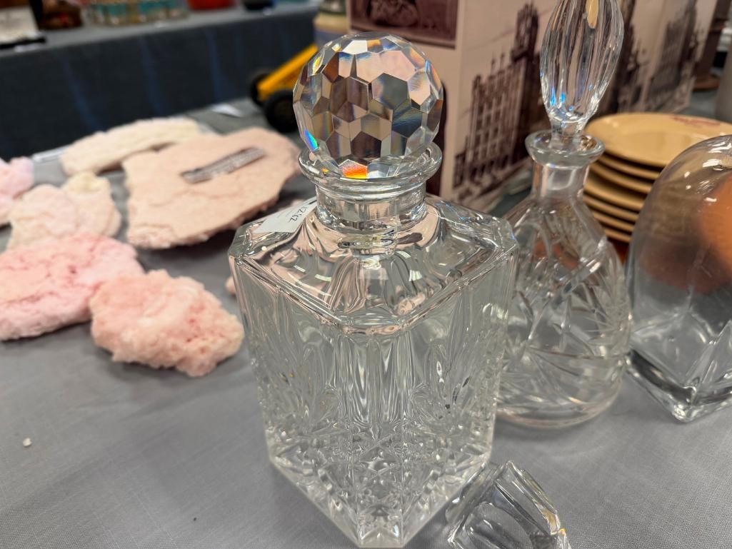 GLASS AND TWO CRYSTAL DECANTERS PLUS TWO EXTRA STOPPERS - 7