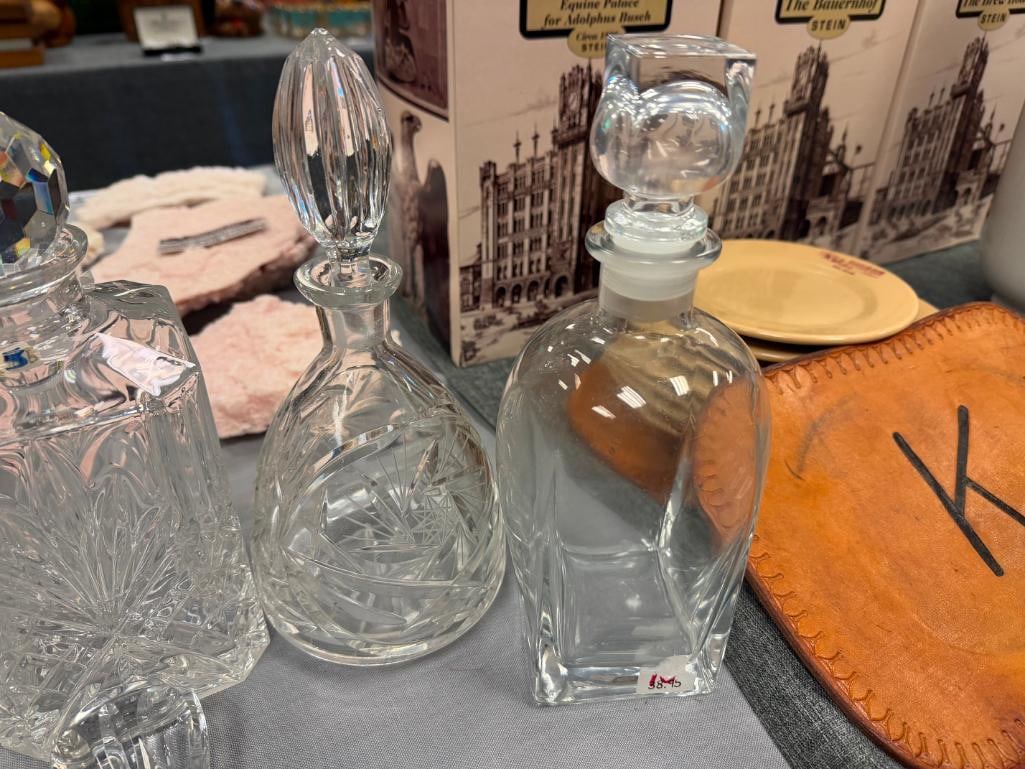 GLASS AND TWO CRYSTAL DECANTERS PLUS TWO EXTRA STOPPERS - 8