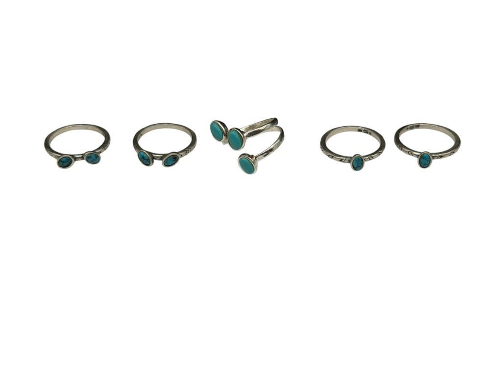 FIVE STERLING SILVER TURQUOISE RINGS INCLUDING SOME SIGNED BY DESIGNER: VARIOUS SIZES, 11.54 GRAMS