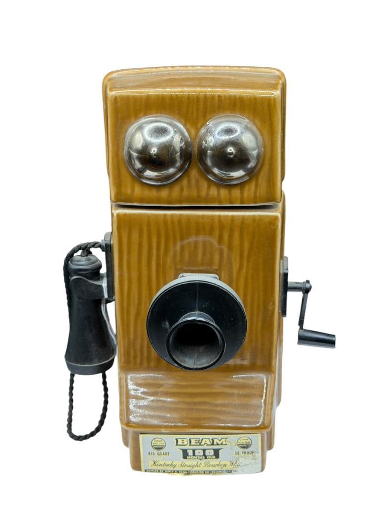 VINTAGE 1907 JIM BEAM KENTUCKY BOURBON WHISKEY DECANTER "1907 WALL TELEPHONE": FILLED WITH CONTENTS, SEAL IS BROKEN, NO CHIPS OR CRACKS 9 1/2" H