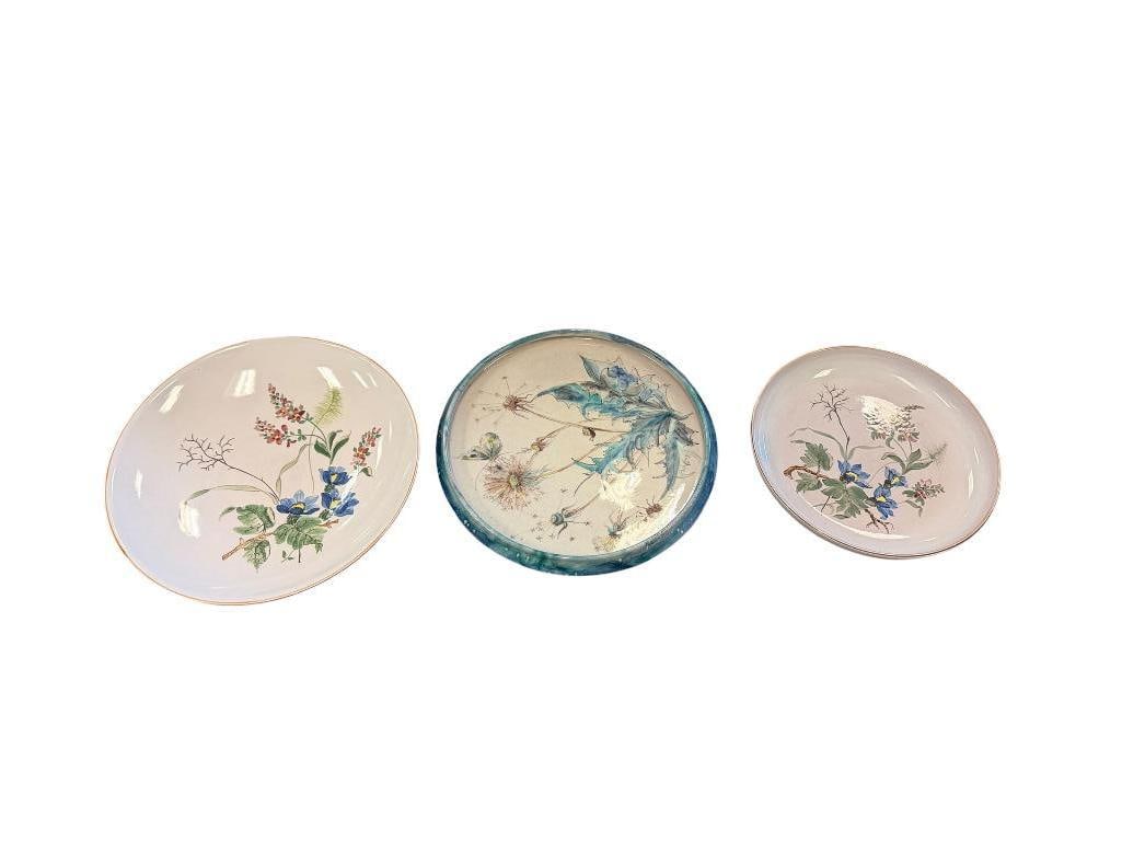 20TH CENTURY POTTERY HAND PAINTED FLORAL PLATES: TWO PLATES ARE MARKED BY THE SAME POTTER, OTHER PLATE IS NOT MARKED, CHIPS OR CRACKS 8" AND 9" ROUND
