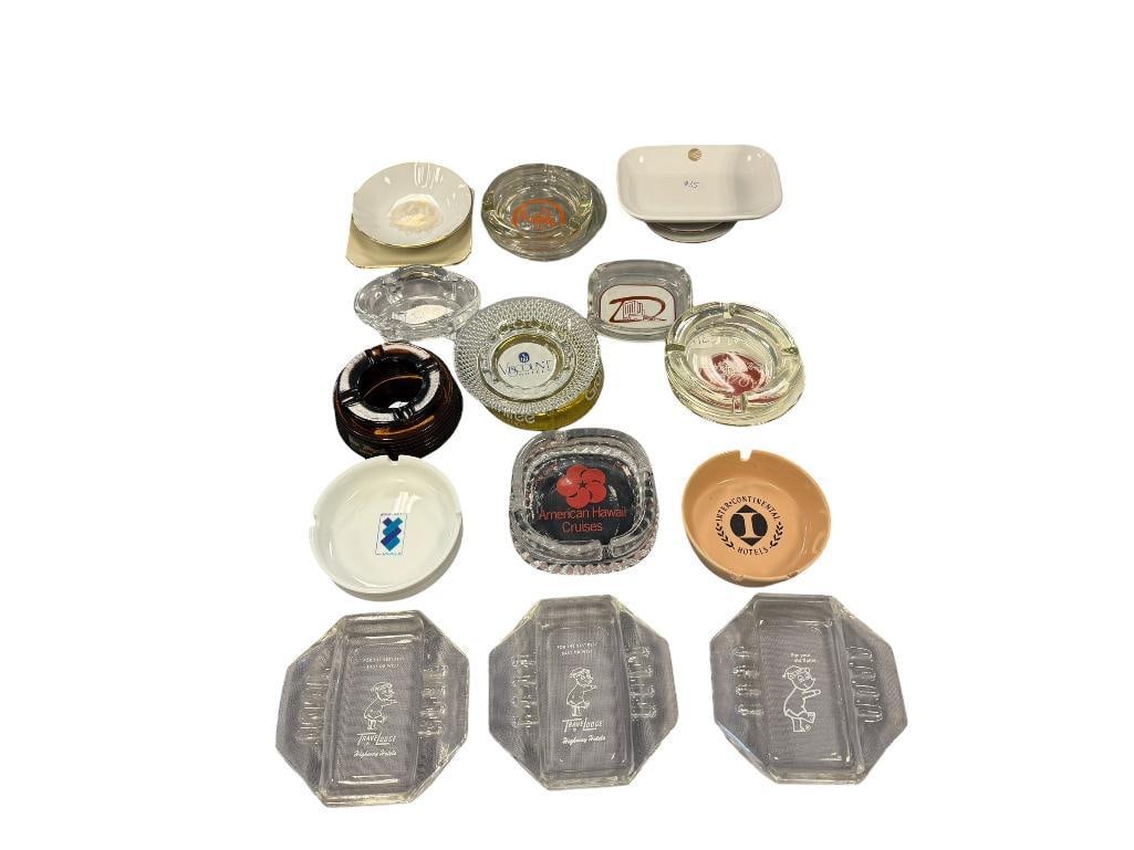21 ASSORTED GLASS AND CERAMIC ASHTRAYS FROM VARIOUS ESTABLISHMENTS: TRAVELODGE, SITMAR CRUISES, GRANTREE, INTERCONTINENTAL HOTELS, VISCOUNT HOTELS, HILTON HOTELS, ETC. 3 1/2" UP TO 5"