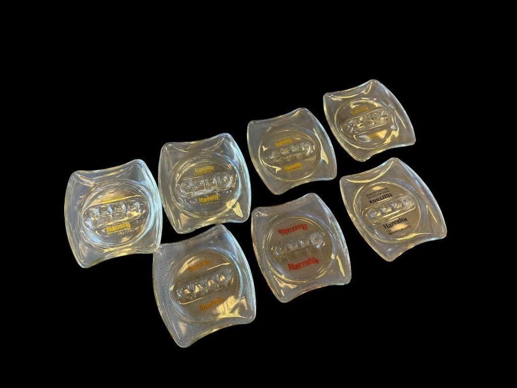 VINTAGE HARRAHS RENO / LAKE TAHOE GLASS ASHTRAYS WITH COLORED LETTERING: NINE PIECES TOTAL 5" 