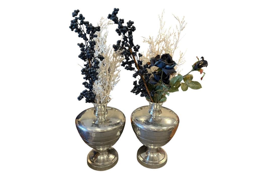 PAIR OF POLISHED CAST ALUMINUM DECORATIVE FOOTED VASES WITH ARTIFICIAL DECORATIONS: LARGE BULBOUS BODY VASES WITH ROUND FOOTED BASE 14" H
