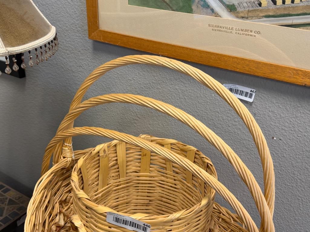 FOUR WICKER BASKETS, THREE WITH ELONGATED HANDLES, ONE IS WASTE BASKET - 15