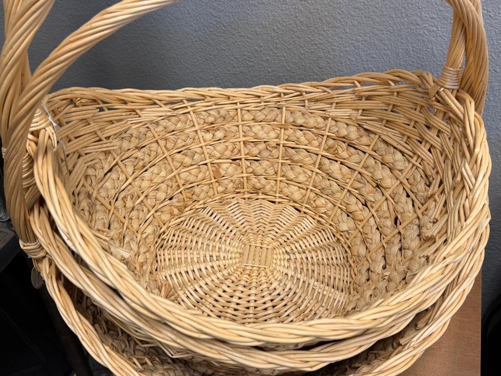 FOUR WICKER BASKETS, THREE WITH ELONGATED HANDLES, ONE IS WASTE BASKET - 17