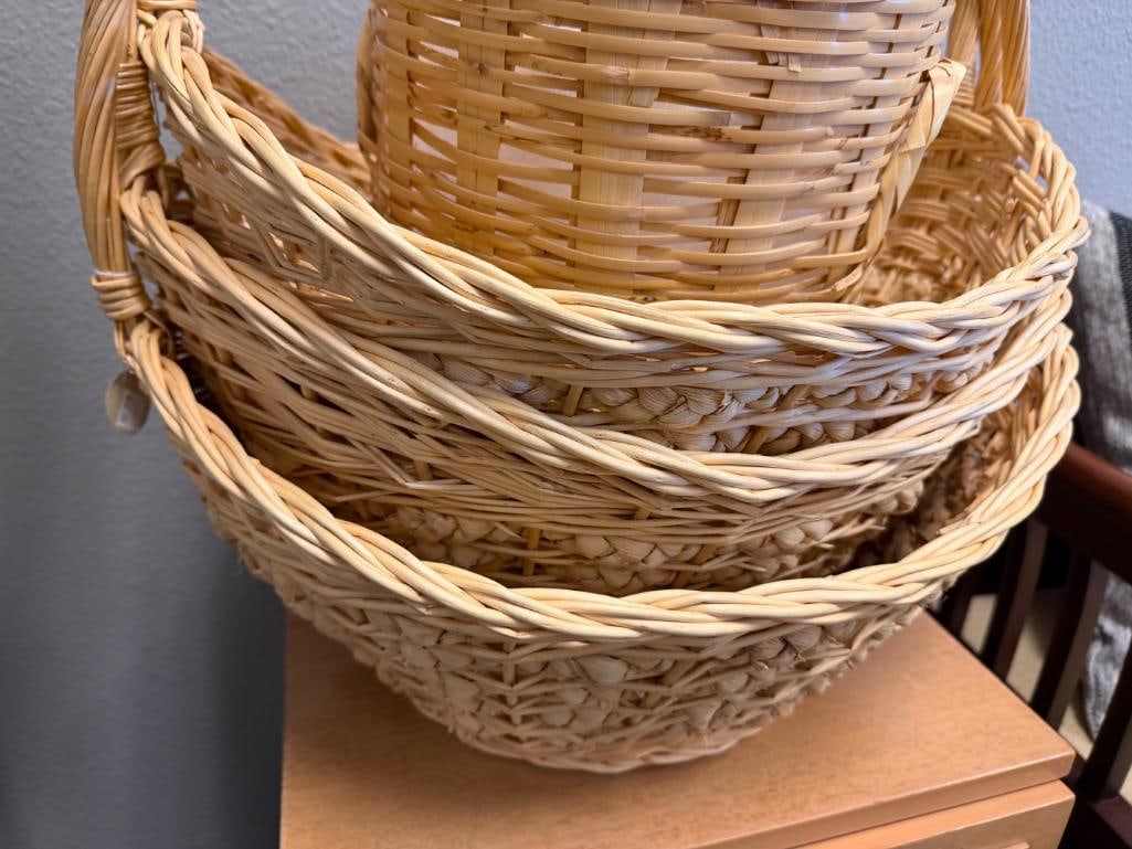 FOUR WICKER BASKETS, THREE WITH ELONGATED HANDLES, ONE IS WASTE BASKET - 4