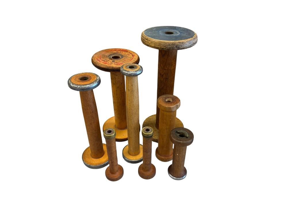 VINTAGE INDUSTRIAL WOODEN SPOOL BOBBINS: INCLUDES VARIOUS SIZES, SOME WITH BRASS OR METAL ACCENTS, FAIR CONDITION LARGEST IS 11 1/2" H