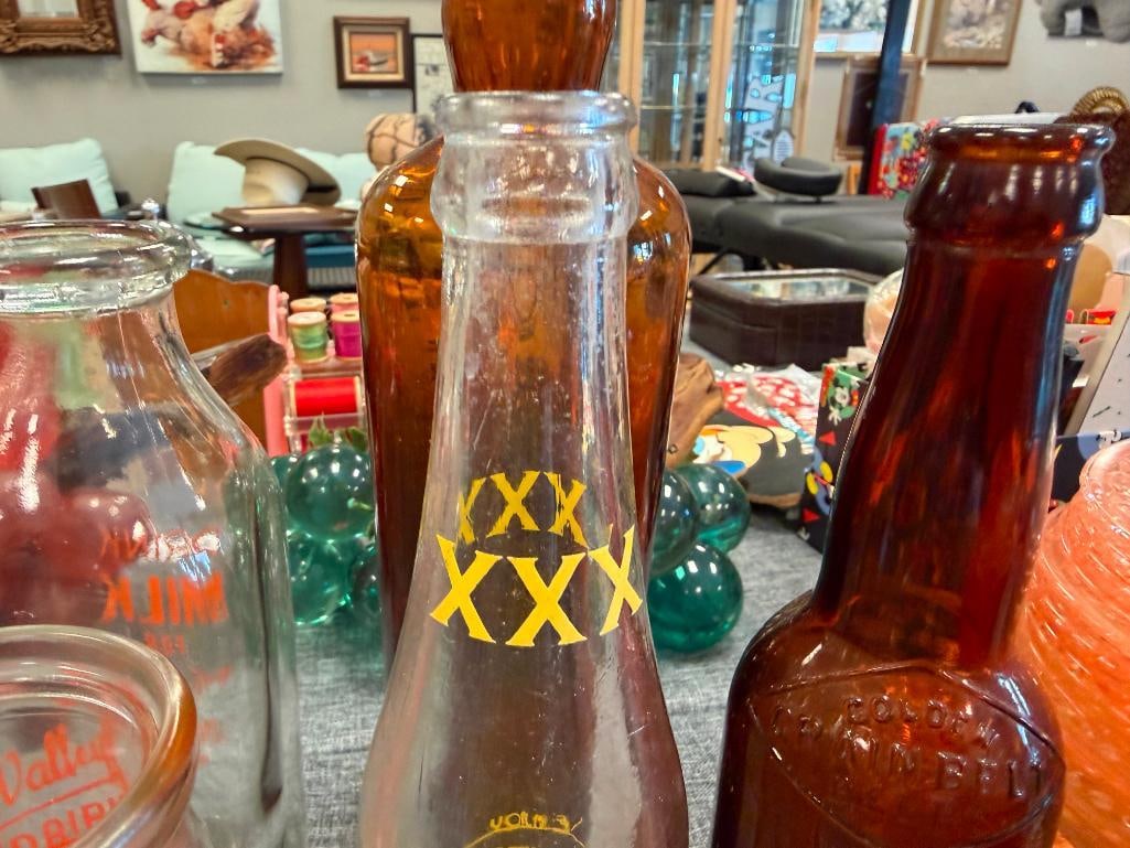 SEVEN ASSORTED ANTIQUE GLASS BOTTLES INCLUDING VALLEY DAIRY AND CRYSTAL MILK BOTTLES - 10