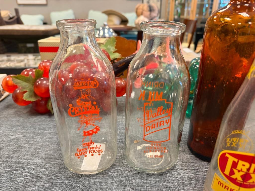 SEVEN ASSORTED ANTIQUE GLASS BOTTLES INCLUDING VALLEY DAIRY AND CRYSTAL MILK BOTTLES - 11