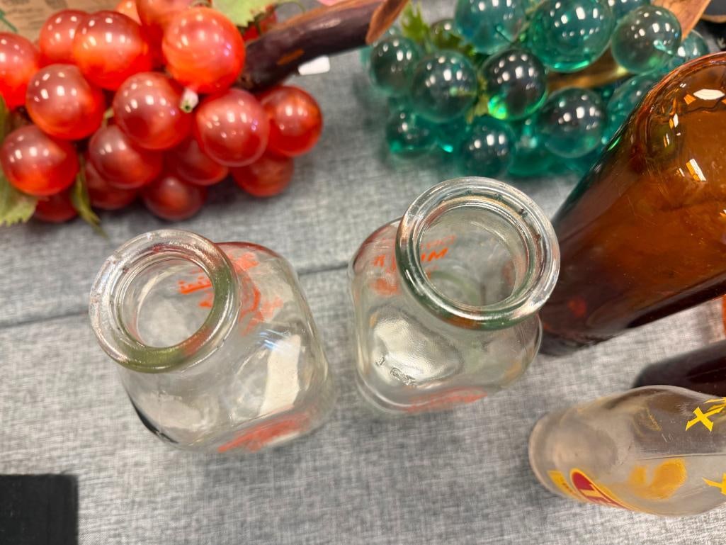 SEVEN ASSORTED ANTIQUE GLASS BOTTLES INCLUDING VALLEY DAIRY AND CRYSTAL MILK BOTTLES - 12