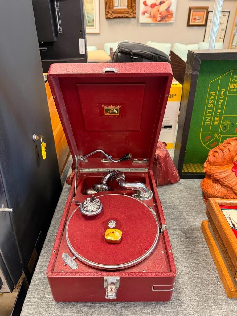 VINTAGE HIS MASTER'S VOICE HMV MODEL 102 PORTABLE GRAMOPHONE NO. 5 A AND APPROX. 20 RECORDS: CIRCA 1940'S, FEATURING A BURGUNDY CASING, PRETTY GOOD CONDITION, TESTED +, INCLUDES TIN OF PINS 11" X 16" X 6" WHEN CLOSED