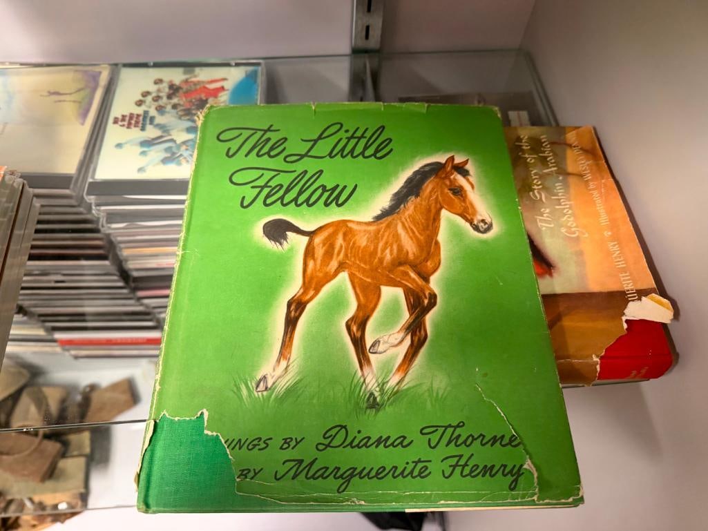 FOUR VINTAGE BOOKS INCLUDING " CRAZY WEATHER " BY CHARLES L. MCNICHOLS AND " BLACK BEAUTY " BY SE... - 12