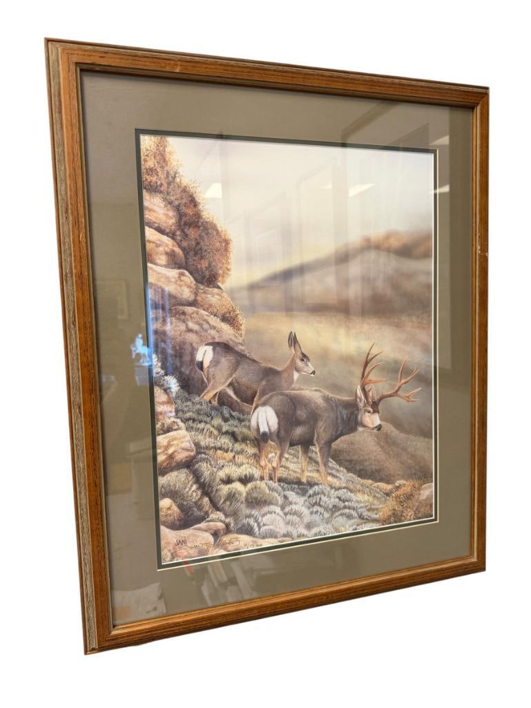 JANI KREUTZJANS NEVADA ARTIST ARTIST PROOF PRINT OF MULE DEER BUCK AND DOE LANDSCAPE NO. 31/75 AP: ART DEPICTS BUCK AND DOE IN DESERT LANDSCAPE, SIGNED LOWER RIGHT, FRAMED 23 1/2" X 29" FRAME