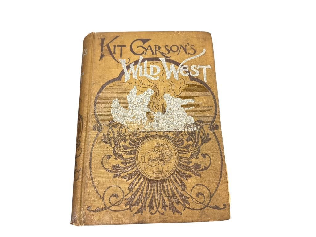 1880 KIT CARSON'S WILD WEST BOOK BY DEWITT C. PETERS PUBLISHED BY GEORGE SULLY: EMBOSSED TEXTILE COVERS WITH ILLUSTRATIONS AND LETTERING, COMPLETE, BUT IN POOR CONDITION 7 3/4" X 10 1/2" 