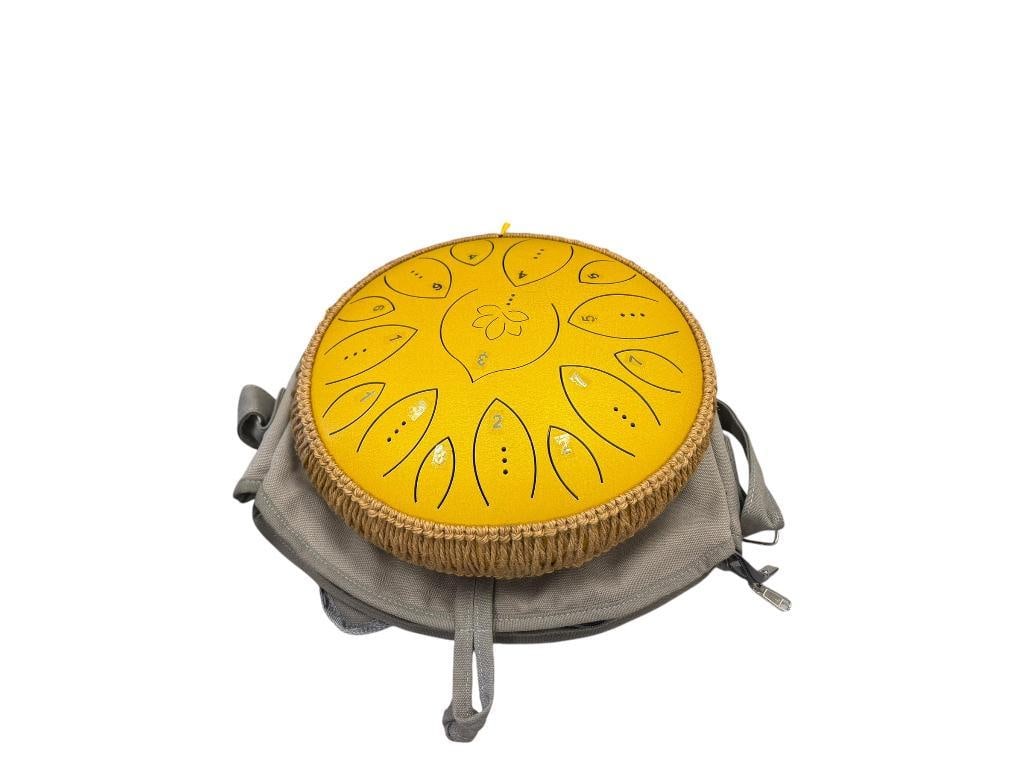 STEEL DRUM PERCUSSION INSTRUMENT WITH TWO RUBBER END DRUM STICKS: IN LIKE-NEW CONDITION WITH TRAVEL / STORAGE BAG, INCLUDES SONG BOOK 12" ROUND