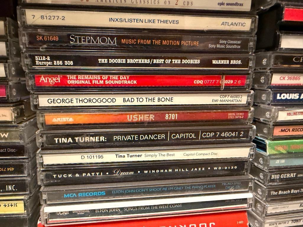 MORE THAN 150 ASSORTED CD'S FEATURING VARIOUS ARTISTS AND GENRES OF MUSIC - 7