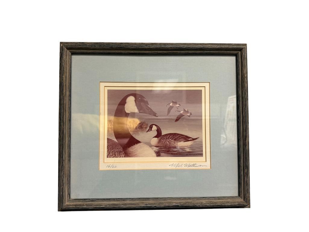 LIMITED EDITION SIGNED AND NUMBERED PRINT BY MEL MATHEWSON OF CANADA GEESE: SIGNED BY ARTIST IN LOWER RIGHT AND NUMBERED 16/20, FRAMED AND DOUBLE MATTED 14" X 12" FRAME