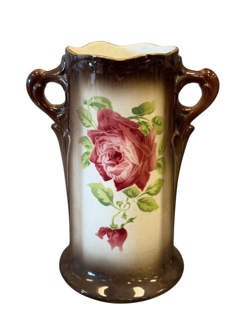 EARLY 20TH CENTURY K&G LUNEVILLE ART NOUVEAU CERAMIC VASE WITH FLORAL DESIGN AND STYLIZED HANDLES: TALL CYLINDRICAL SHAPED VASE WITH FLARED BASE AND STYLIZED RING HANDLES, STENCILED FLORAL DESIGN, MARKED ON THE BOTTOM, MADE IN FRANCE , FLAW FROM FACTORY ON THE RIM 10" H