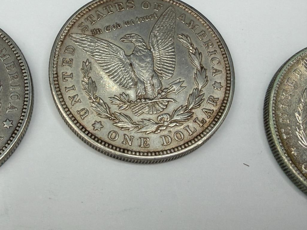 FIVE U.S. MORGAN SILVER DOLLARS FEATURING VARIOUS DATES AND MINT MARKS - 10