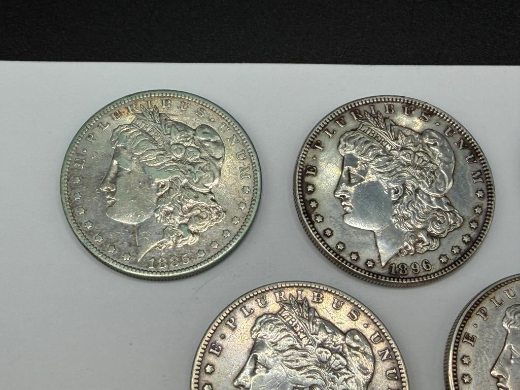 FIVE U.S. MORGAN SILVER DOLLARS FEATURING VARIOUS DATES AND MINT MARKS - 2