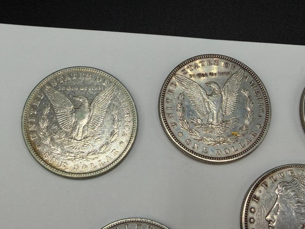FIVE U.S. MORGAN SILVER DOLLARS FEATURING VARIOUS DATES AND MINT MARKS - 3