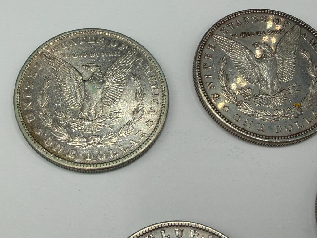 FIVE U.S. MORGAN SILVER DOLLARS FEATURING VARIOUS DATES AND MINT MARKS - 4