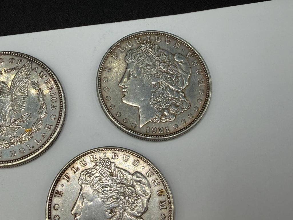 FIVE U.S. MORGAN SILVER DOLLARS FEATURING VARIOUS DATES AND MINT MARKS - 5