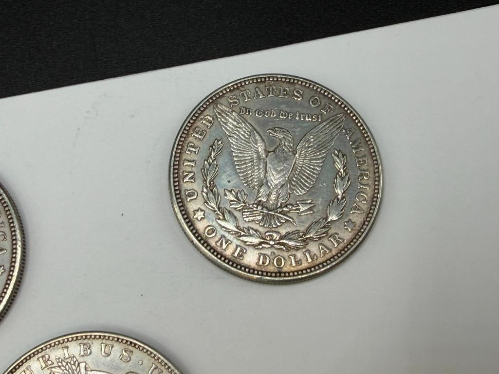 FIVE U.S. MORGAN SILVER DOLLARS FEATURING VARIOUS DATES AND MINT MARKS - 6