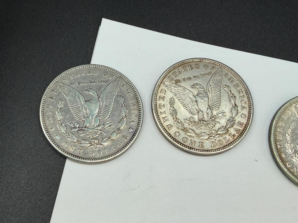 FIVE U.S. MORGAN SILVER DOLLARS FEATURING VARIOUS DATES AND MINT MARKS - 8