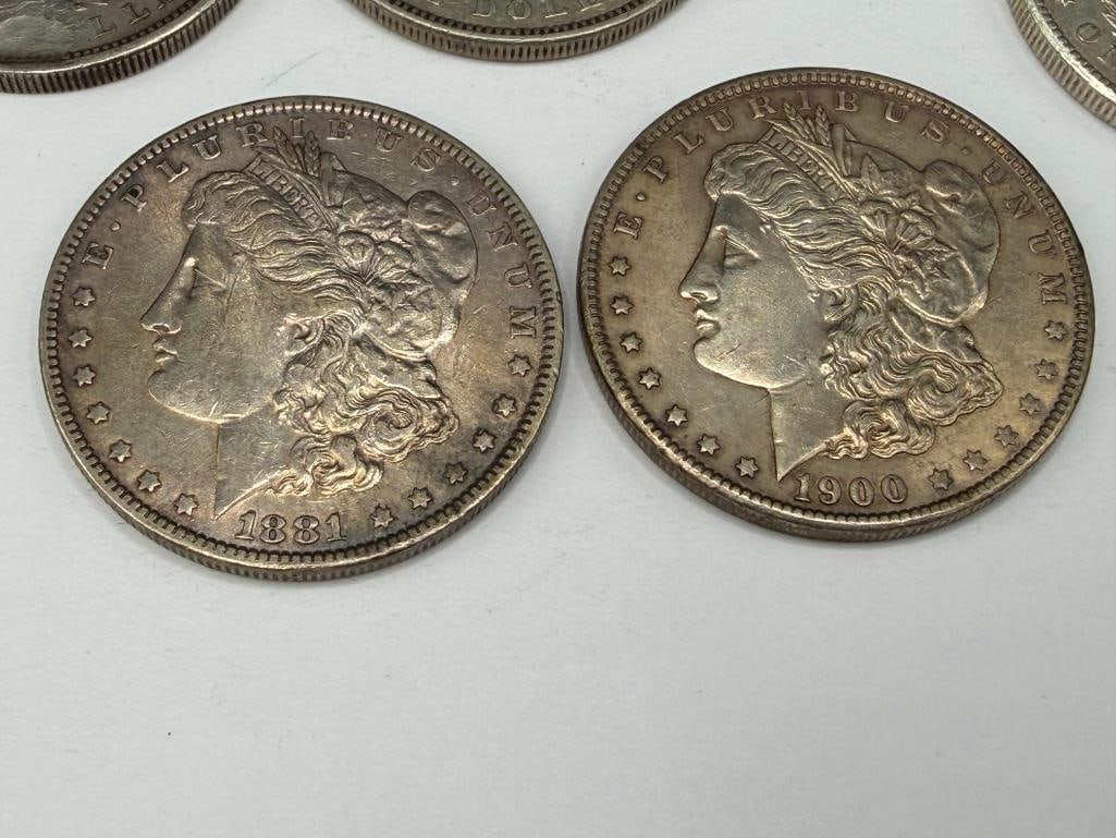 FIVE U.S. MORGAN SILVER DOLLARS FEATURING VARIOUS DATES AND MINT MARKS - 10