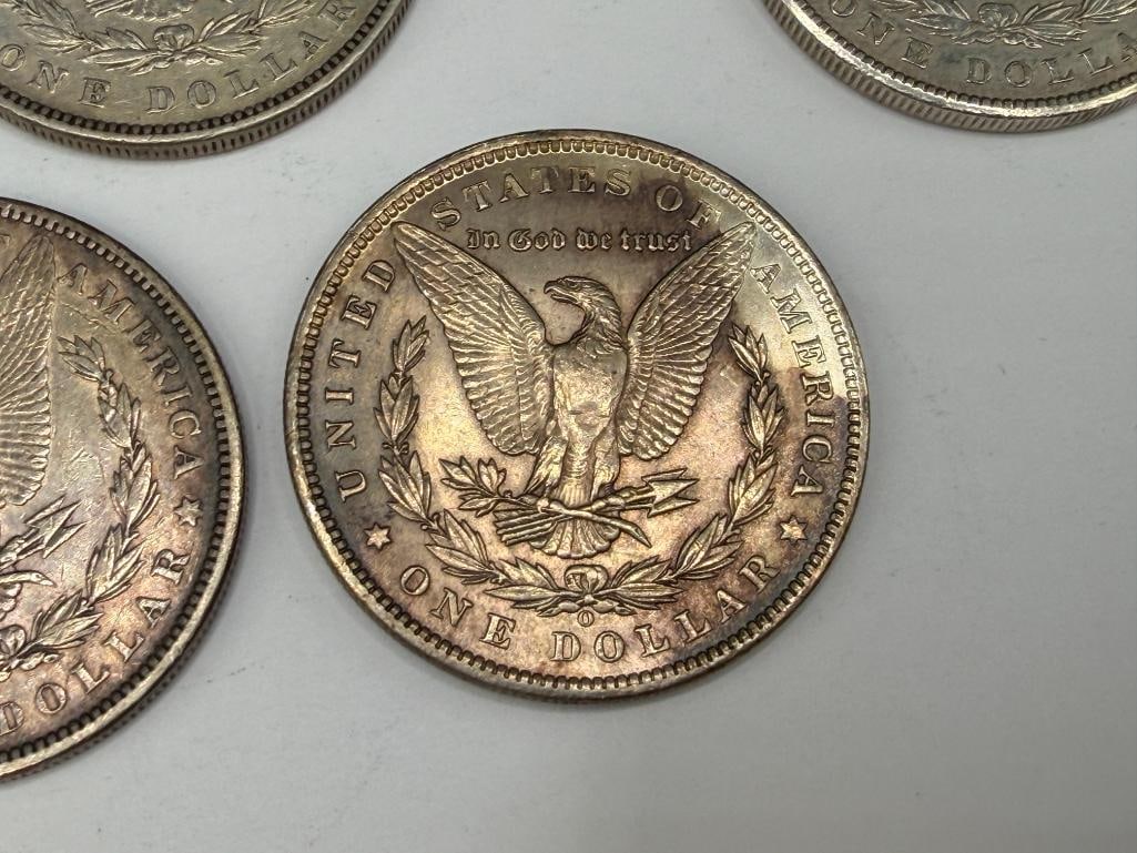 FIVE U.S. MORGAN SILVER DOLLARS FEATURING VARIOUS DATES AND MINT MARKS - 12
