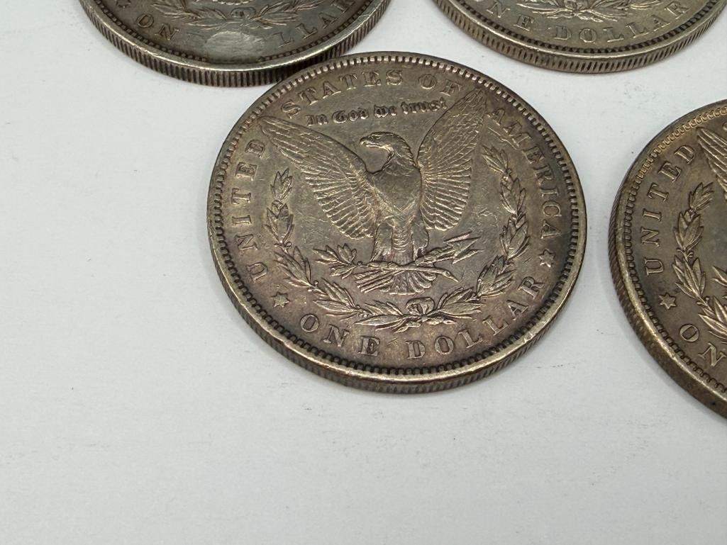 FIVE U.S. MORGAN SILVER DOLLARS FEATURING VARIOUS DATES AND MINT MARKS - 14