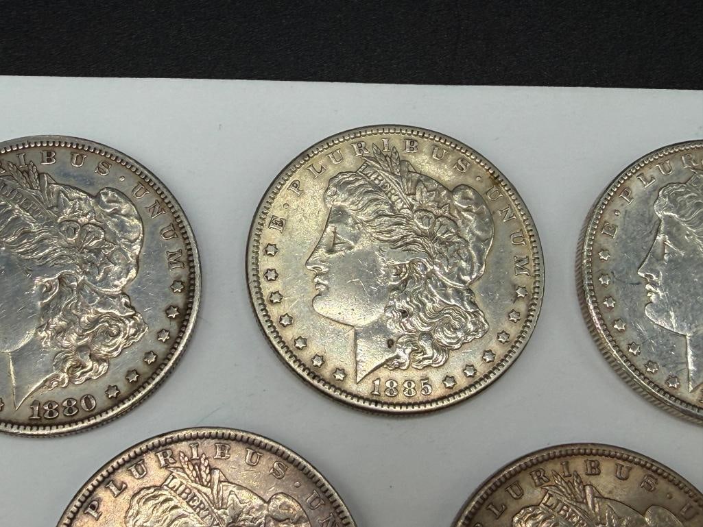 FIVE U.S. MORGAN SILVER DOLLARS FEATURING VARIOUS DATES AND MINT MARKS - 3