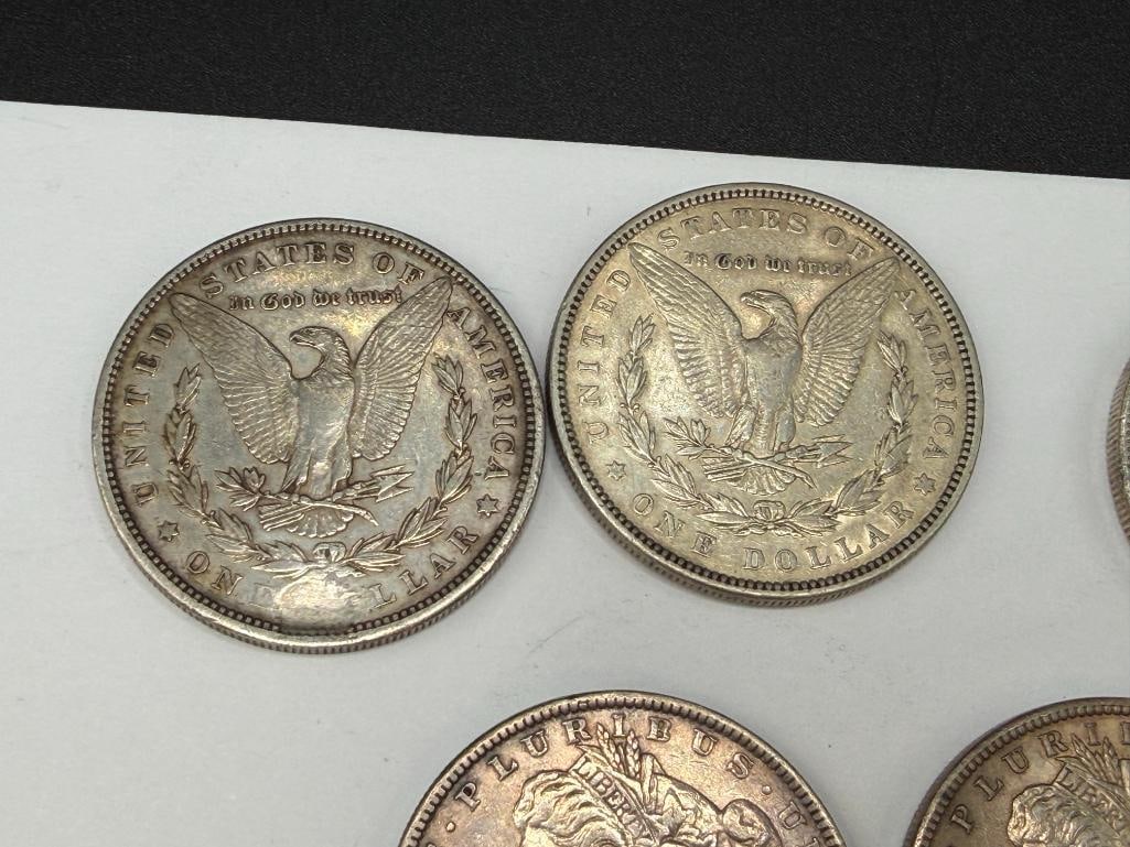 FIVE U.S. MORGAN SILVER DOLLARS FEATURING VARIOUS DATES AND MINT MARKS - 4