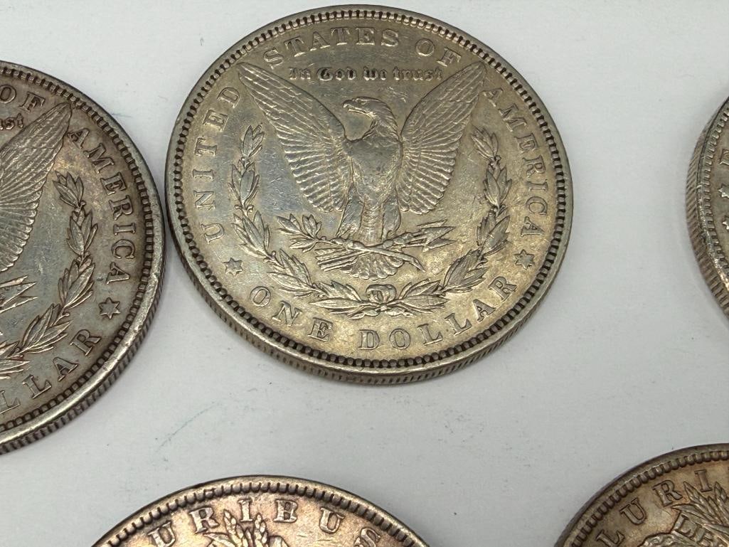 FIVE U.S. MORGAN SILVER DOLLARS FEATURING VARIOUS DATES AND MINT MARKS - 6