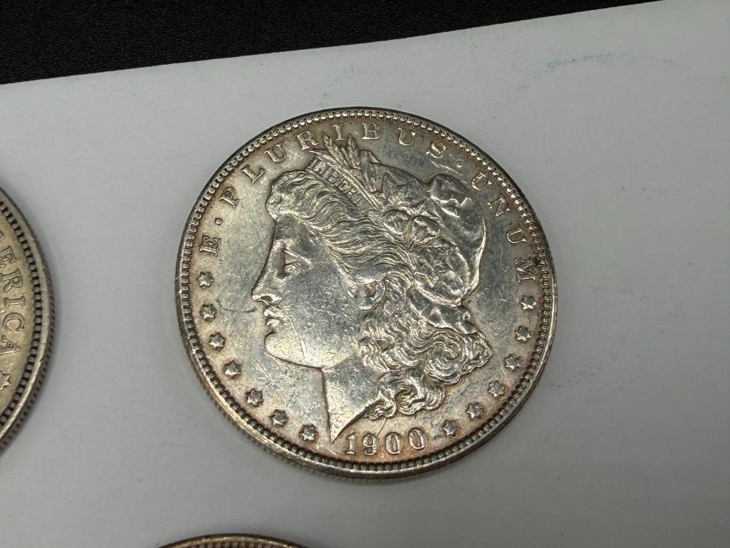 FIVE U.S. MORGAN SILVER DOLLARS FEATURING VARIOUS DATES AND MINT MARKS - 7