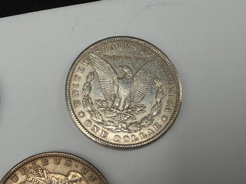 FIVE U.S. MORGAN SILVER DOLLARS FEATURING VARIOUS DATES AND MINT MARKS - 8