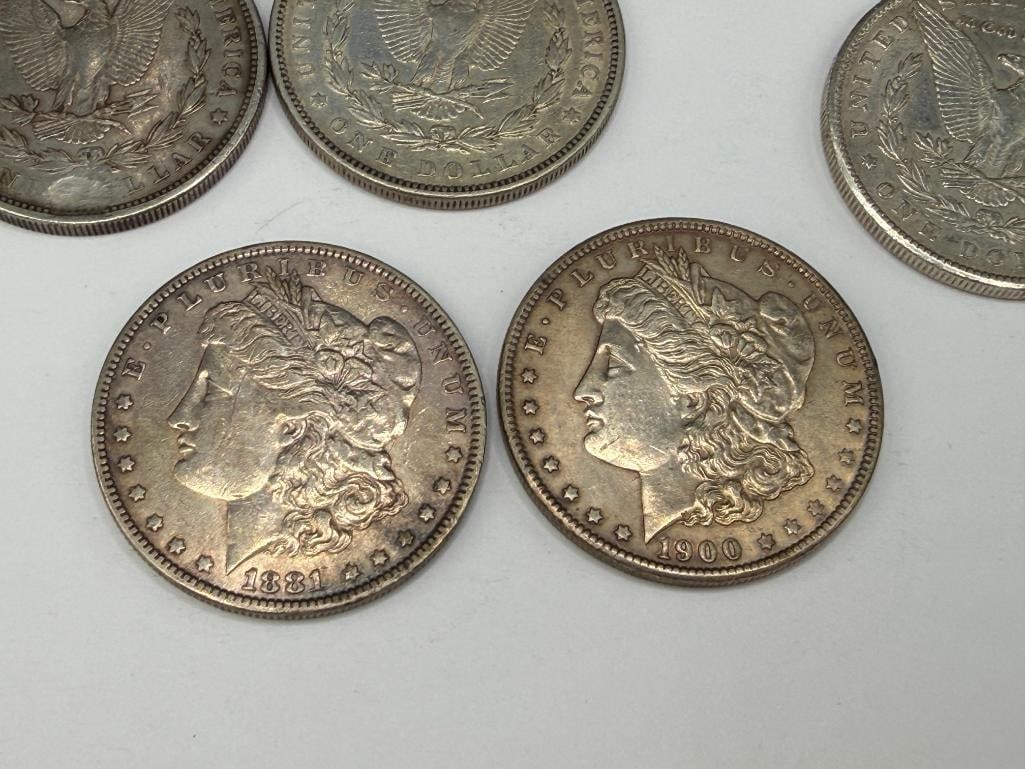 FIVE U.S. MORGAN SILVER DOLLARS FEATURING VARIOUS DATES AND MINT MARKS - 9