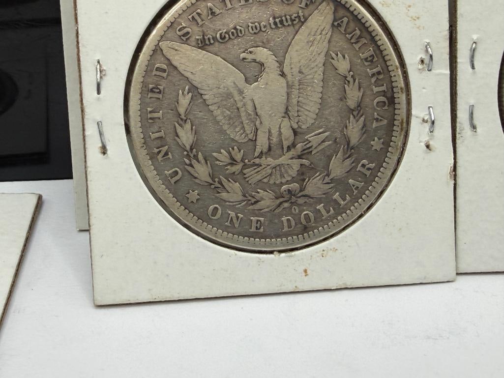 SEVEN U.S. MORGAN SILVER DOLLARS FEATURING VARIOUS DATES AND MINT MARKS - 12
