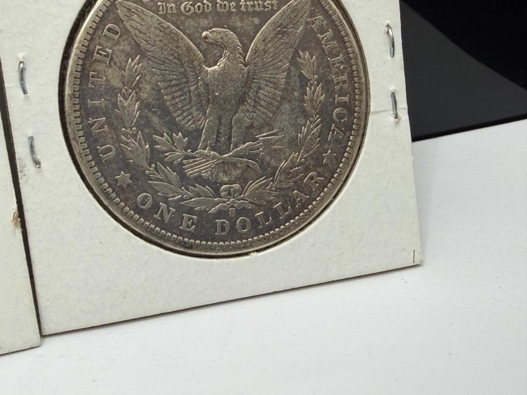 SEVEN U.S. MORGAN SILVER DOLLARS FEATURING VARIOUS DATES AND MINT MARKS - 13