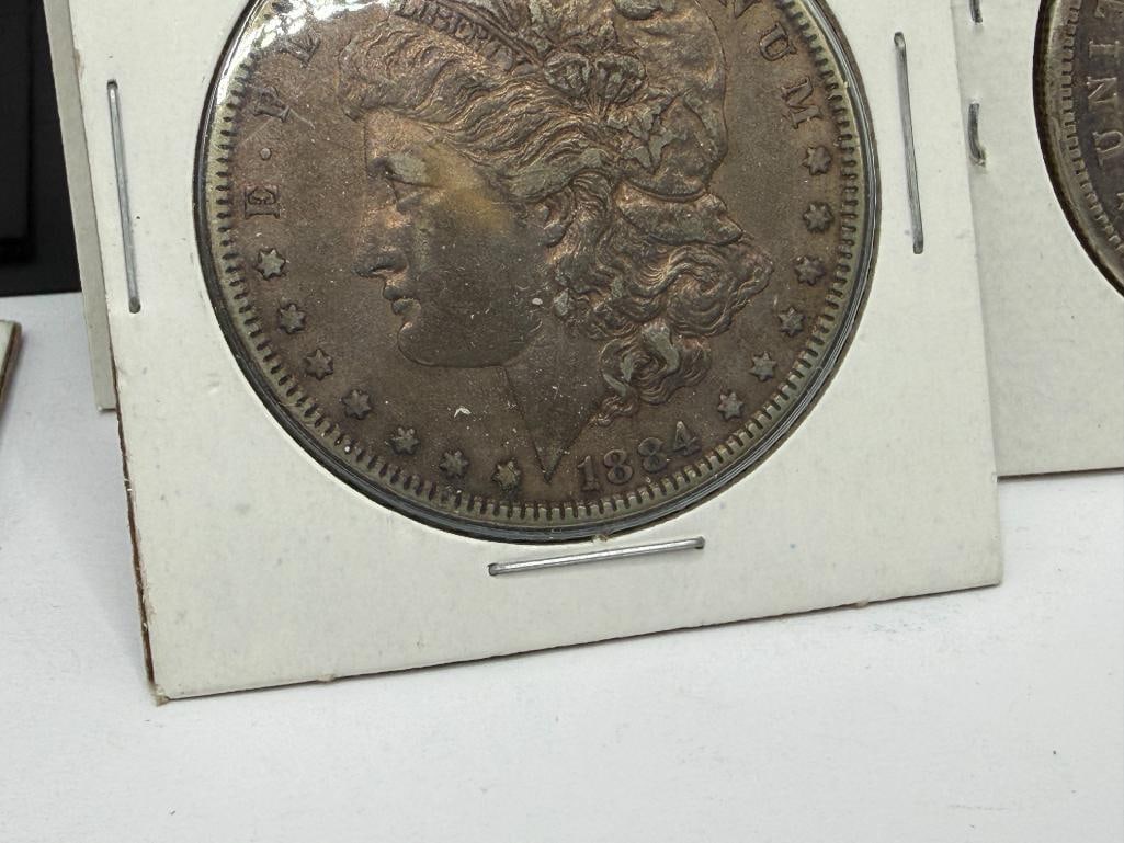 SEVEN U.S. MORGAN SILVER DOLLARS FEATURING VARIOUS DATES AND MINT MARKS - 15
