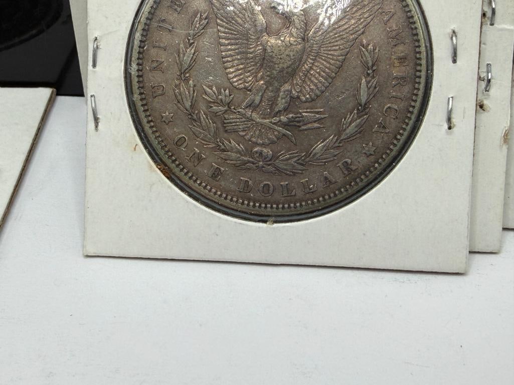 SEVEN U.S. MORGAN SILVER DOLLARS FEATURING VARIOUS DATES AND MINT MARKS - 17