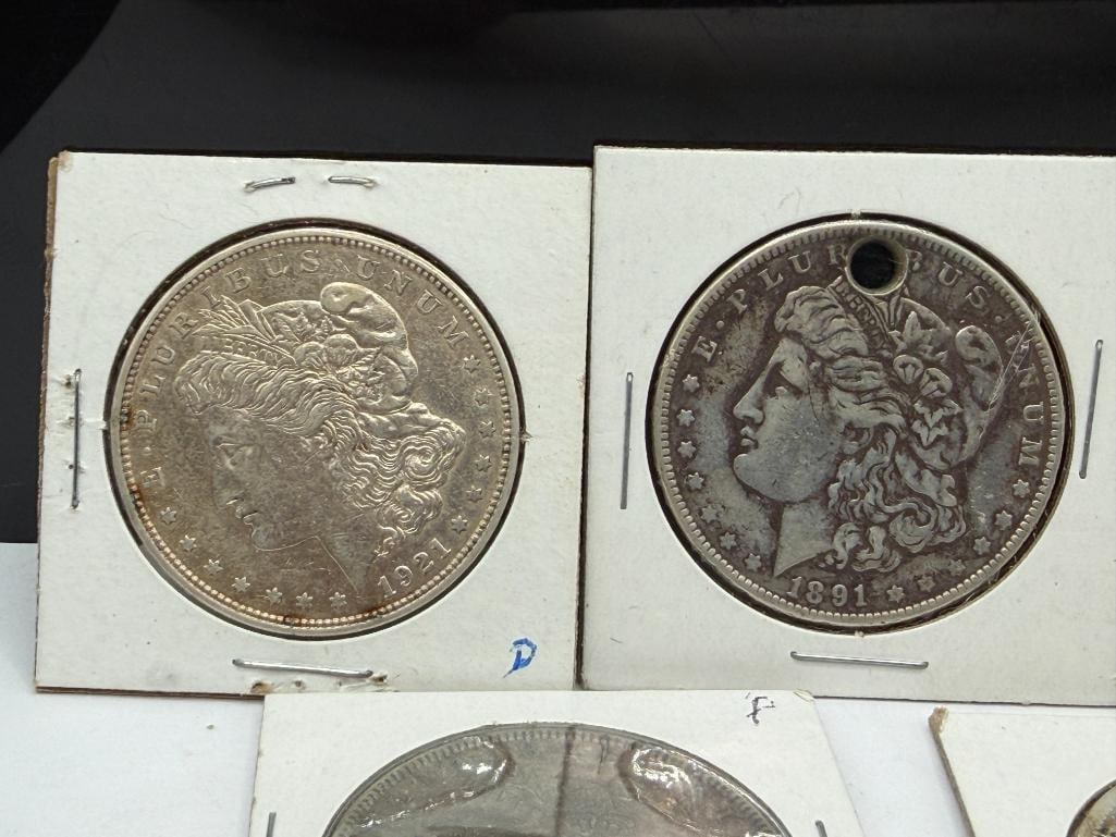 SEVEN U.S. MORGAN SILVER DOLLARS FEATURING VARIOUS DATES AND MINT MARKS - 2